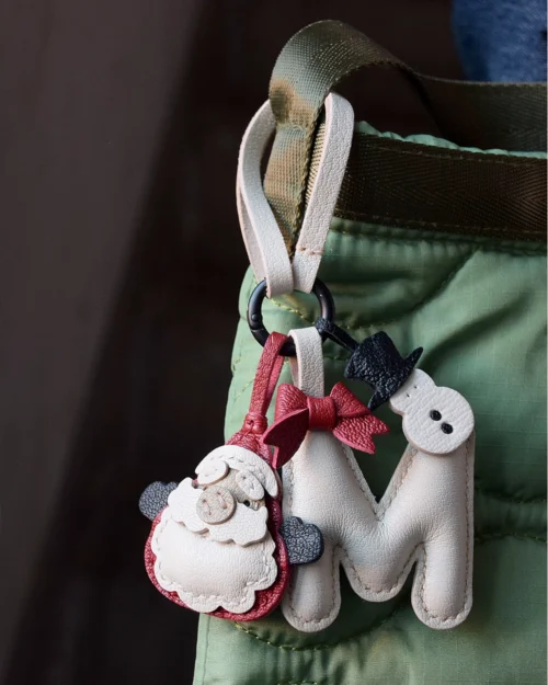A festive letter bag charm handcrafted from French goatskin leather. Choose from 26 letters and create custom combinations, hand-stitched and gift boxed.