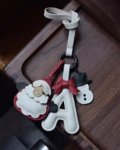 A festive letter bag charm handcrafted from French goatskin leather. Choose from 26 letters and create custom combinations, hand-stitched and gift boxed.