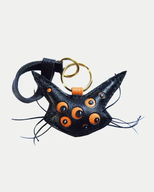 Cat bag charm handcrafted from French goatskin leather, hand-stitched over three days and gift boxed for bags, keys, or car key accessories.