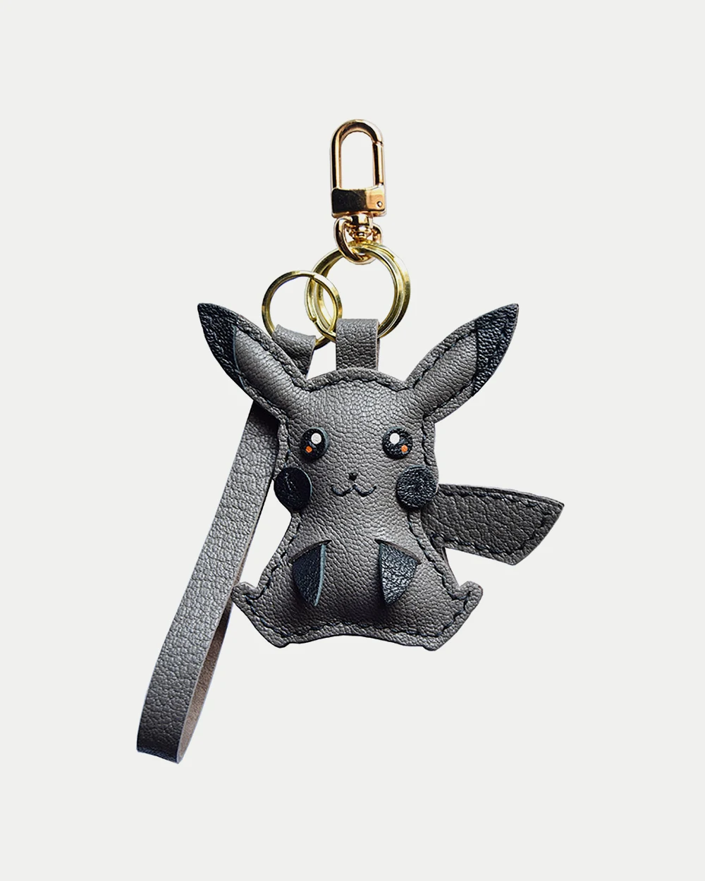 Electric mouse bag charm handcrafted from premium leather, hand-stitched over three days and gift boxed for bags, keys, or car key accessories.