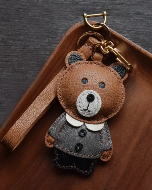 Bear Bag Charm handcrafted from French goatskin leather, hand-stitched over three days and gift boxed for bags, keys, and car key accessories.