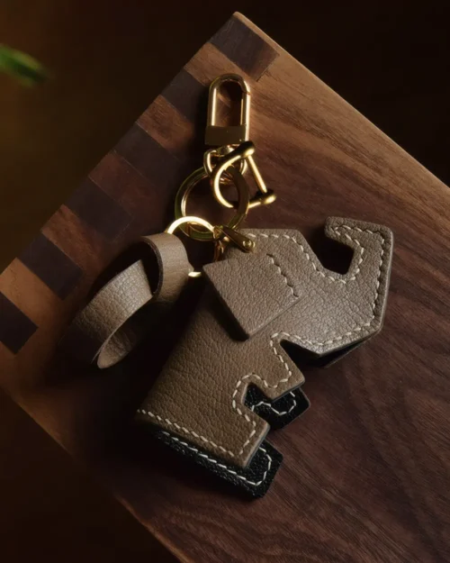 Elephant Bag Charm handcrafted from French goatskin leather, hand-stitched over three days and gift boxed for bags, keys, and car key accessories.