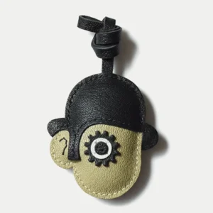 Clockwork Character bag charm handcrafted from premium leather. Hand-stitched over three days and gift boxed for bags, keys, or car keys.