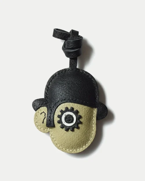 Clockwork Character bag charm handcrafted from premium leather. Hand-stitched over three days and gift boxed for bags, keys, or car keys.