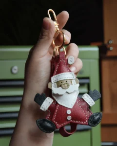 leather santa bag charm, santa leather keychain, christmas santa bag charm, handmade santa accessory, festive leather keychain, holiday gift charm