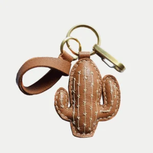 Cactus bag charm handcrafted from French goatskin leather, hand-stitched over three days and gift boxed for bags, keys, or car key accessories.