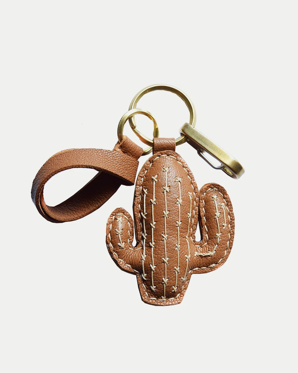 Cactus bag charm handcrafted from French goatskin leather, hand-stitched over three days and gift boxed for bags, keys, or car key accessories.