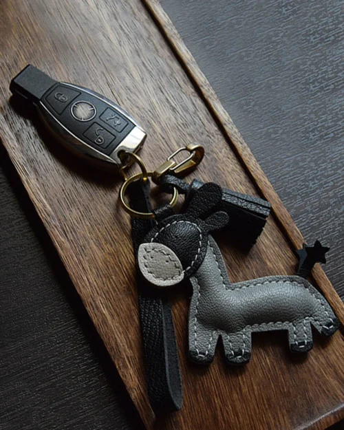Donkey Bag Charm handcrafted from premium leather. Hand-stitched over three days and gift boxed for bags, keys, or car keys.