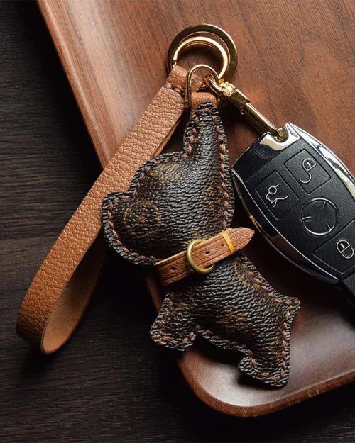 French bulldog bag charm handcrafted from premium leather, hand-stitched over three days and gift boxed for bags, keys, or car accessories.