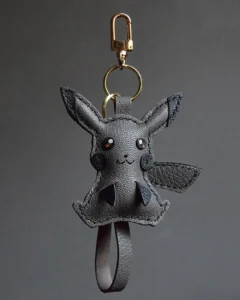 Electric mouse bag charm handcrafted from premium leather, hand-stitched over three days and gift boxed for bags, keys, or car key accessories.