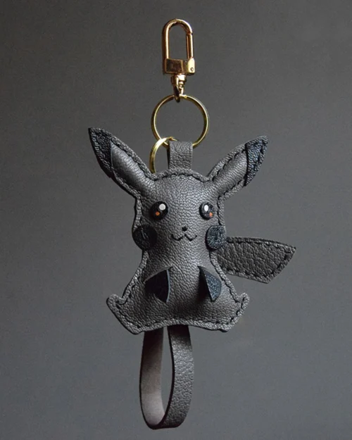 Electric mouse bag charm handcrafted from premium leather, hand-stitched over three days and gift boxed for bags, keys, or car key accessories.