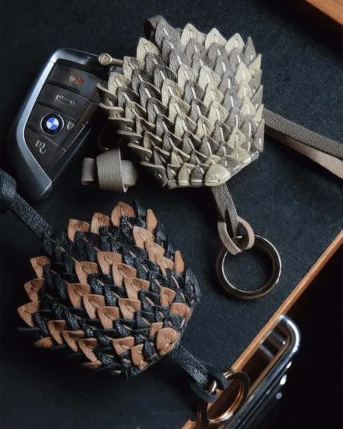 leather scale flower bag charm, snakeskin texture flower keychain, handmade leather flower accessory, layered floral bag charm, sculptural leather keychain