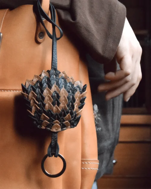 leather scale flower bag charm, snakeskin texture flower keychain, handmade leather flower accessory, layered floral bag charm, sculptural leather keychain