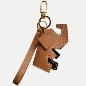 Elephant Bag Charm handcrafted from French goatskin leather, hand-stitched over three days and gift boxed for bags, keys, and car key accessories.
