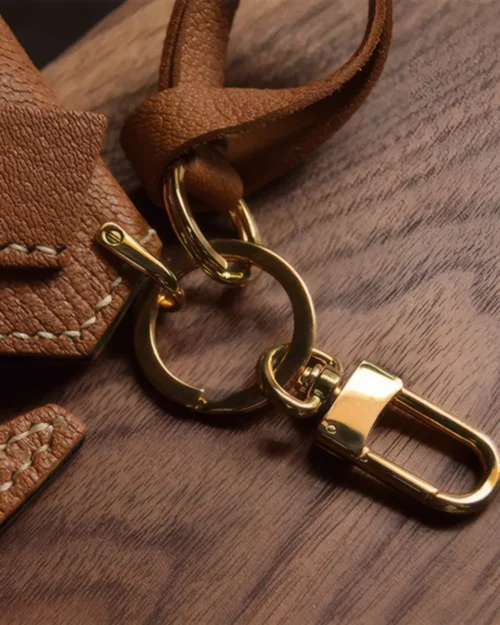 Elephant Bag Charm handcrafted from French goatskin leather, hand-stitched over three days and gift boxed for bags, keys, and car key accessories.