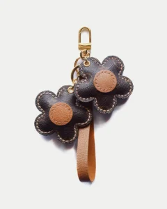 Flower Bag Charm handcrafted from French goatskin leather, hand-stitched over three days and gift boxed for bags, keys, and car key accessories.