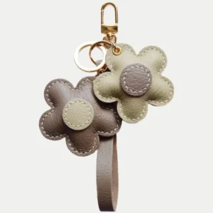 Flower Bag Charm handcrafted from French goatskin leather, hand-stitched over three days and gift boxed for bags, keys, and car key accessories.