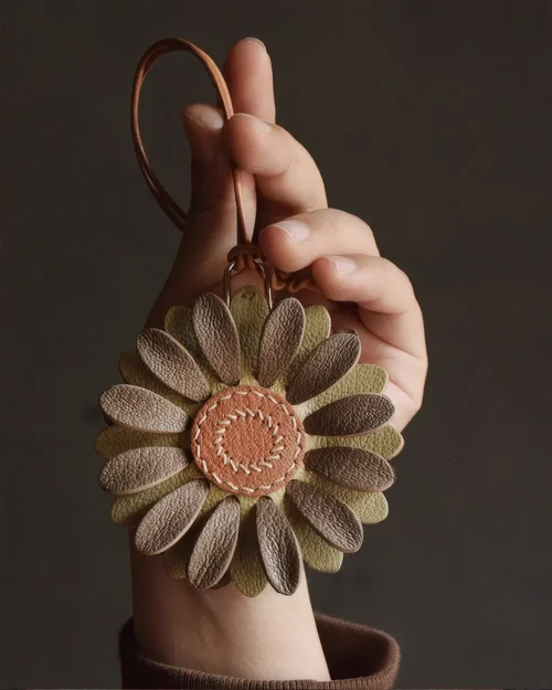 Flower Bag Charm handcrafted from French goatskin leather, hand-stitched over three days and gift boxed for bags, keys, and car key accessories.