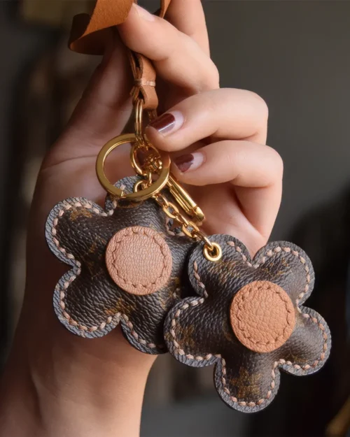 Flower Bag Charm handcrafted from French goatskin leather, hand-stitched over three days and gift boxed for bags, keys, and car key accessories.