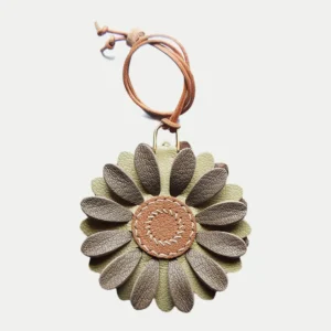 Flower Bag Charm handcrafted from French goatskin leather, hand-stitched over three days and gift boxed for bags, keys, and car key accessories.