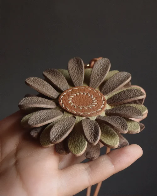 Flower Bag Charm handcrafted from French goatskin leather, hand-stitched over three days and gift boxed for bags, keys, and car key accessories.