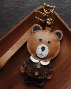 Bear Bag Charm handcrafted from French goatskin leather, hand-stitched over three days and gift boxed for bags, keys, and car key accessories.