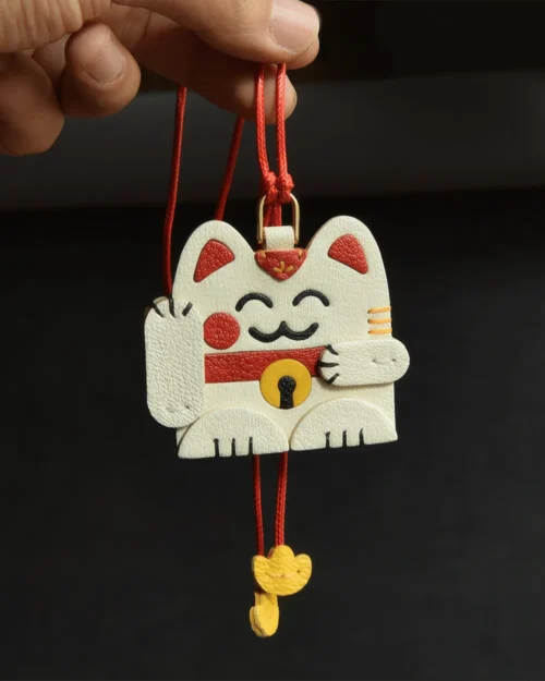 leather lucky cat bag charm, lucky cat leather keychain, handmade lucky cat charm, fortune cat bag accessory, leather lucky symbol keychain