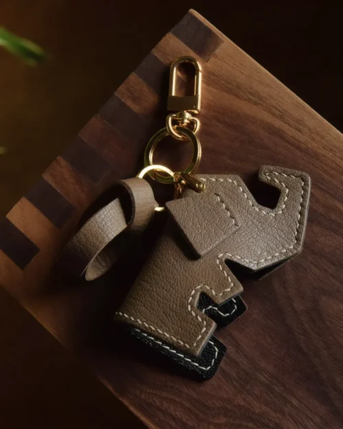 Elephant Bag Charm handcrafted from French goatskin leather, hand-stitched over three days and gift boxed for bags, keys, and car key accessories.
