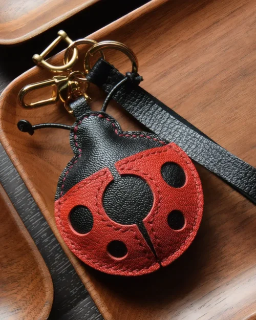 Ladybug Bag Charm handcrafted from French goatskin leather, hand-stitched over three days and gift boxed for bags, keys, and car key accessories.