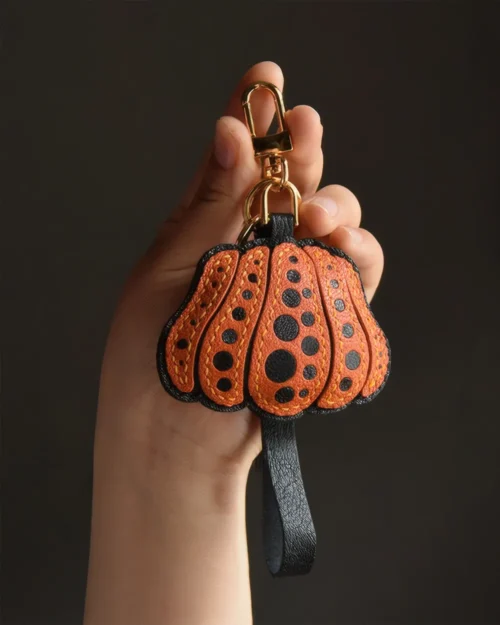 Pumpkin Bag Charm handcrafted from French goatskin leather, hand-stitched over three days and gift boxed for bags, keys, and car key accessories.