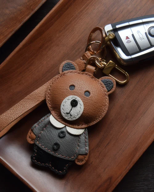 Bear Bag Charm handcrafted from French goatskin leather, hand-stitched over three days and gift boxed for bags, keys, and car key accessories.