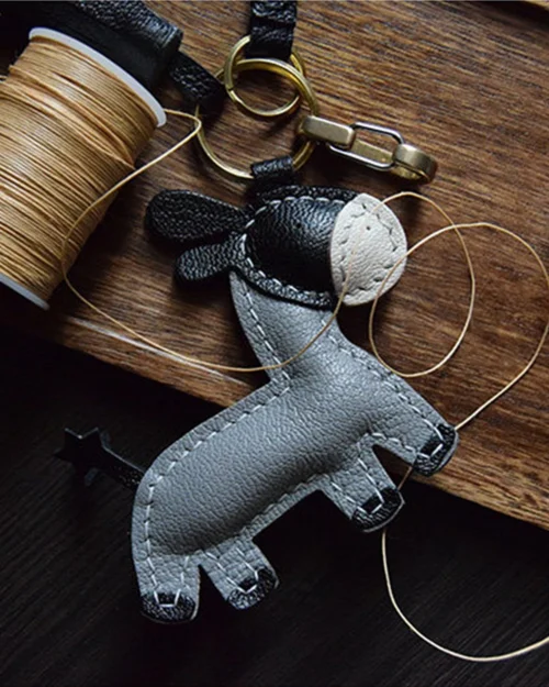 Donkey Bag Charm handcrafted from premium leather. Hand-stitched over three days and gift boxed for bags, keys, or car keys.