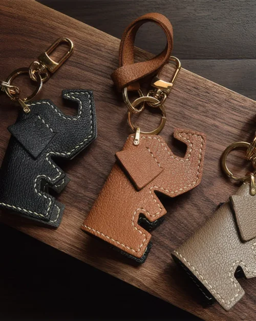 Elephant Bag Charm handcrafted from French goatskin leather, hand-stitched over three days and gift boxed for bags, keys, and car key accessories.
