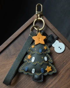 leather christmas tree bag charm, christmas tree leather keychain, handmade holiday bag charm, festive leather accessory, winter gift keychain