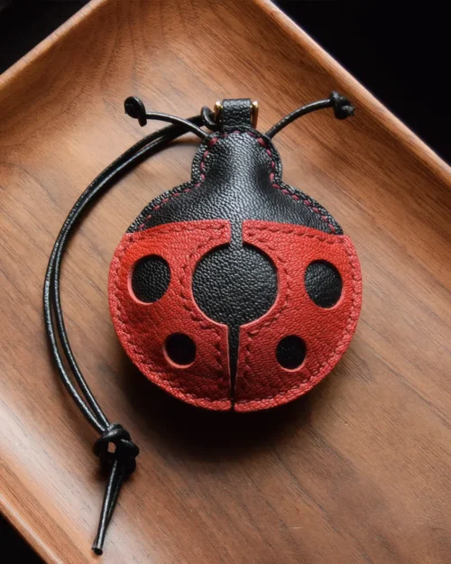 Ladybug Bag Charm handcrafted from French goatskin leather, hand-stitched over three days and gift boxed for bags, keys, and car key accessories.