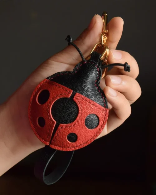 Ladybug Bag Charm handcrafted from French goatskin leather, hand-stitched over three days and gift boxed for bags, keys, and car key accessories.