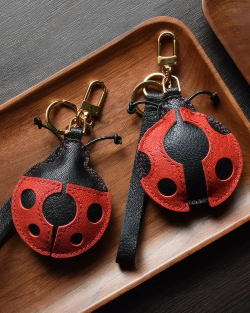 Ladybug Bag Charm handcrafted from French goatskin leather, hand-stitched over three days and gift boxed for bags, keys, and car key accessories.
