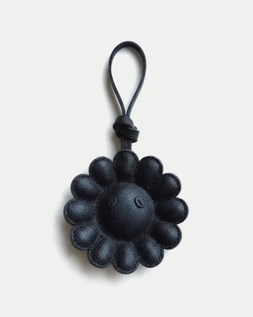 leather black daisy bag charm, black daisy leather keychain, handmade flower bag charm, sculptural floral accessory, minimalist black flower keychain