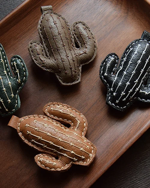 Cactus bag charm handcrafted from French goatskin leather, hand-stitched over three days and gift boxed for bags, keys, or car key accessories.