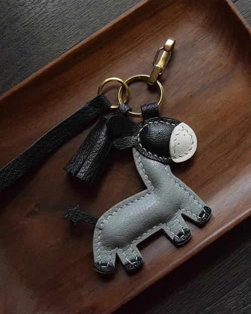 Donkey Bag Charm handcrafted from premium leather. Hand-stitched over three days and gift boxed for bags, keys, or car keys.