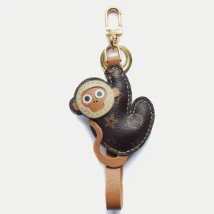 Monkey bag charm handcrafted from premium leather, fully hand-stitched over three days and gift boxed for bags, keys, or car accessories.
