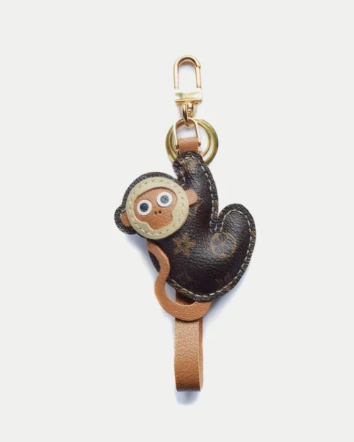 Monkey bag charm handcrafted from premium leather, fully hand-stitched over three days and gift boxed for bags, keys, or car accessories.