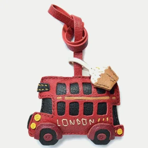 An iconic London bus bag charm handcrafted from French goatskin leather. Hand-stitched over three days and gift boxed, ideal for bags, keys, or car keys.