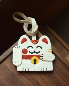 leather lucky cat bag charm, lucky cat leather keychain, handmade lucky cat charm, fortune cat bag accessory, leather lucky symbol keychain