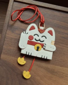 leather lucky cat bag charm, lucky cat leather keychain, handmade lucky cat charm, fortune cat bag accessory, leather lucky symbol keychain
