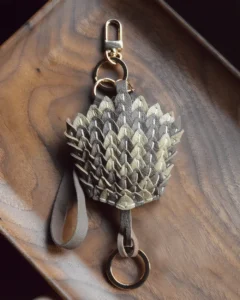 leather scale flower bag charm, snakeskin texture flower keychain, handmade leather flower accessory, layered floral bag charm, sculptural leather keychain