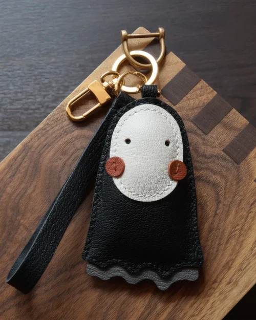 kaonashi bag charm, no face man leather keychain, spirited away bag charm, miyazaki anime keychain, anime bag accessory, handmade leather keychain