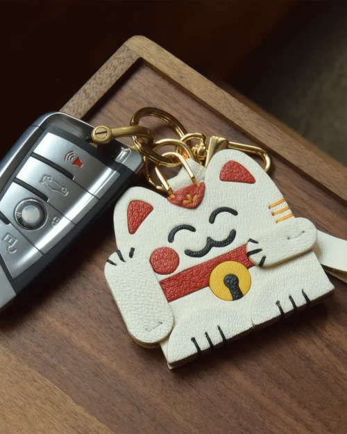 leather lucky cat bag charm, lucky cat leather keychain, handmade lucky cat charm, fortune cat bag accessory, leather lucky symbol keychain