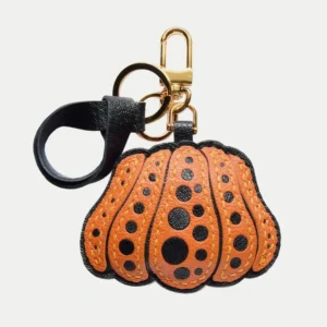 Pumpkin Bag Charm handcrafted from French goatskin leather, hand-stitched over three days and gift boxed for bags, keys, and car key accessories.