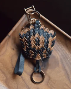 leather scale flower bag charm, snakeskin texture flower keychain, handmade leather flower accessory, layered floral bag charm, sculptural leather keychain